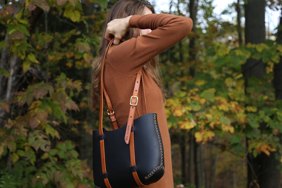 The Forest Tote in Black cordoban water buffalo with Ochre Steerhide Straps